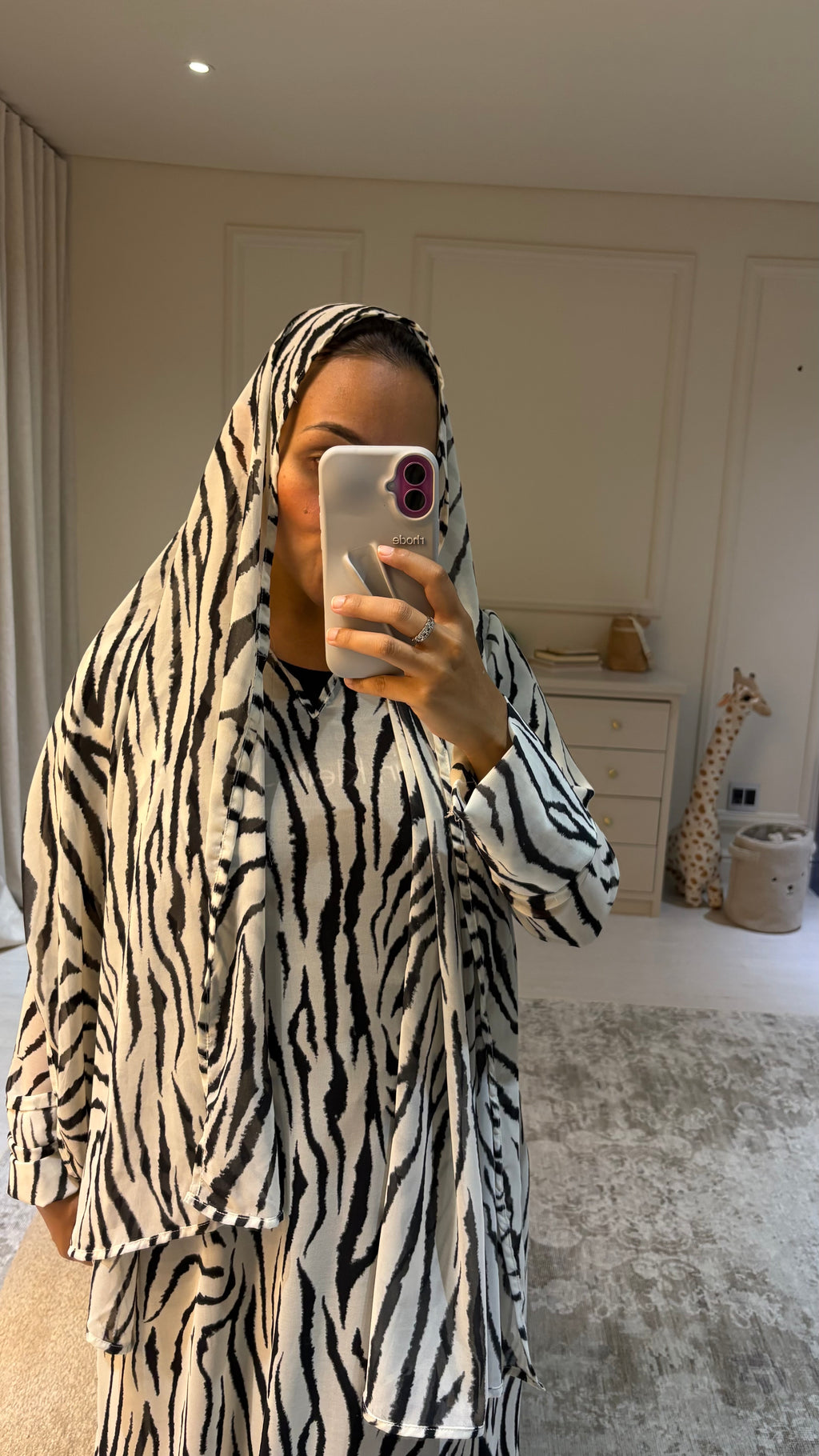 FAISA all in our zebra abaya